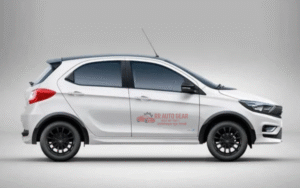 Front view of Tata Tiago 2025 hatchback in red color with LED DRLs